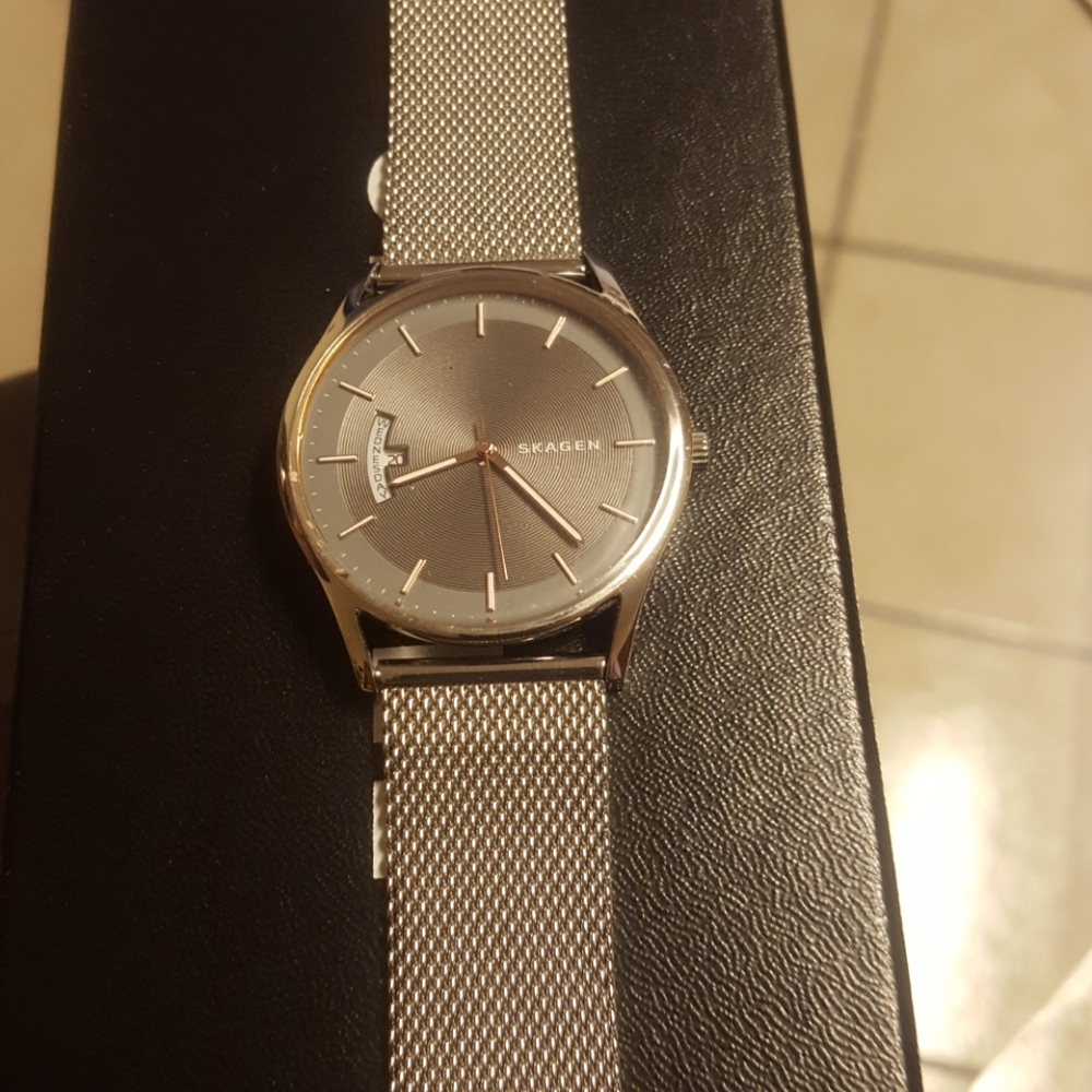 Skagen watch.  Large face.  Silver mesh band.